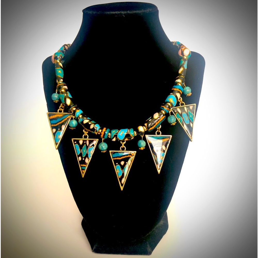 Handmade fashionable necklace with matching earrings.